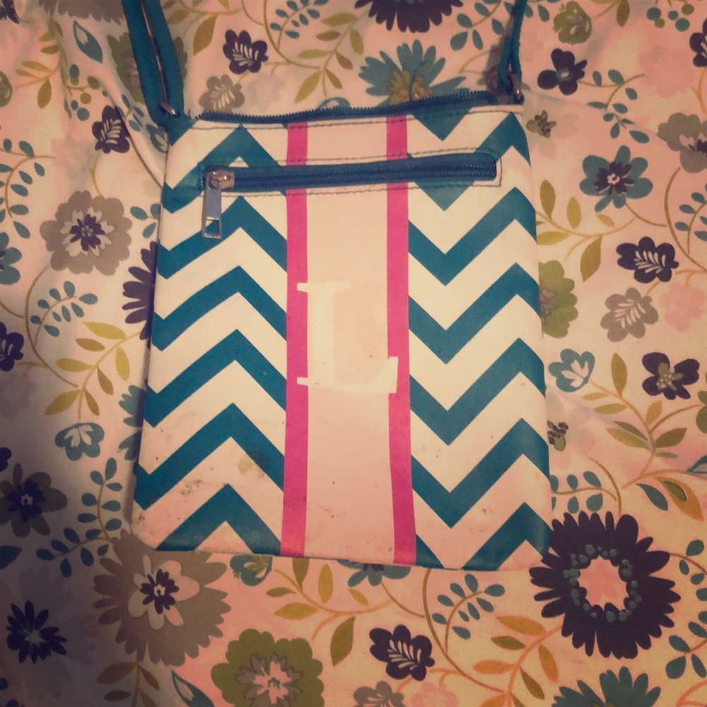 A initialed “L” purse